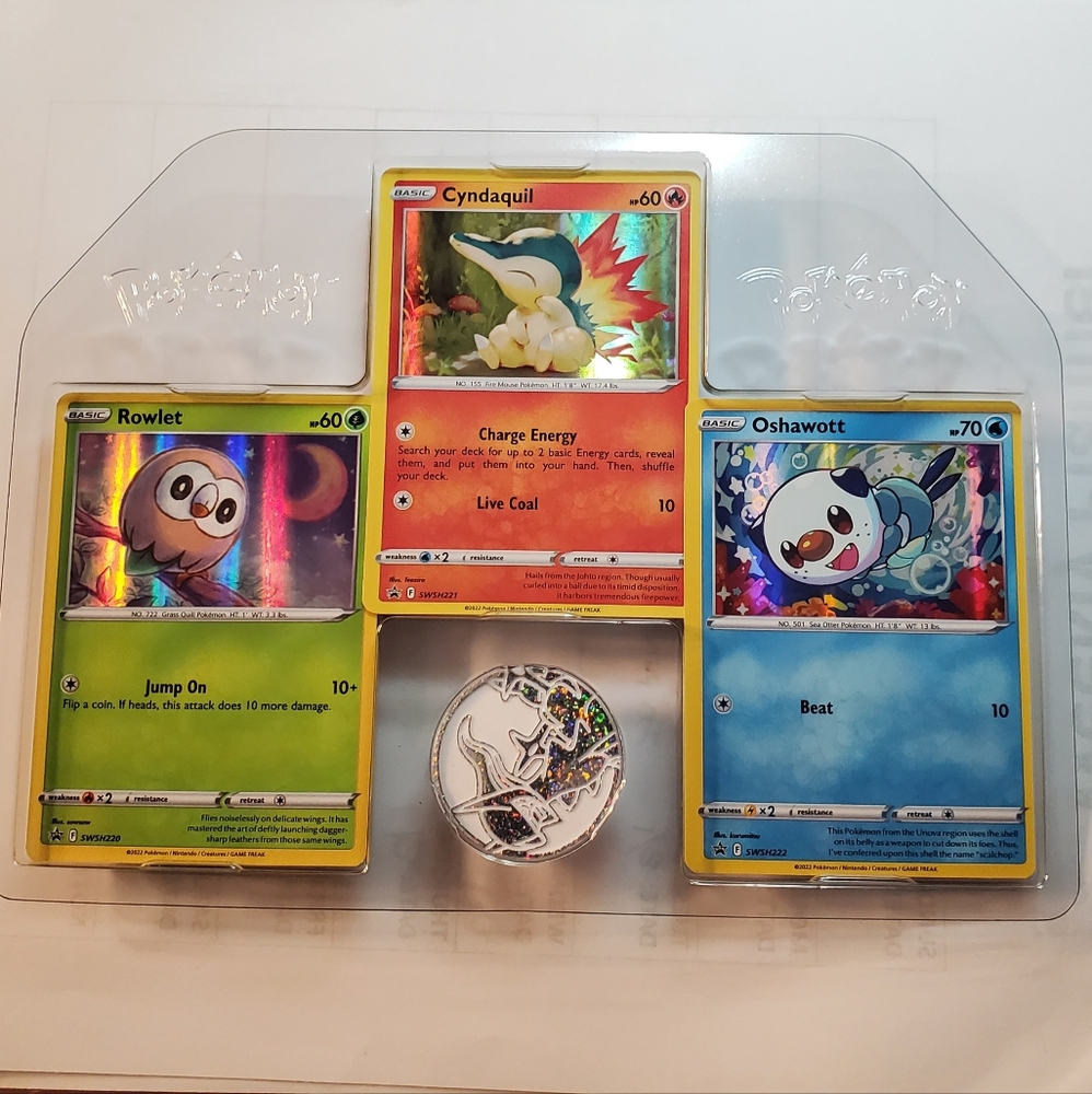 Set of 3 Pokémon Trading Cards and a coin - Rowlet, Cyndaquil, and Oshawott